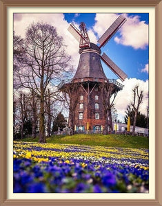 Windmill Beside Blue Flower Hill